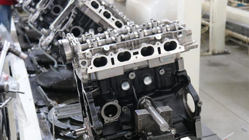 New engine production in progress on the assembly line at Nanjing Woda Auto Technology Co., Ltd. factory.