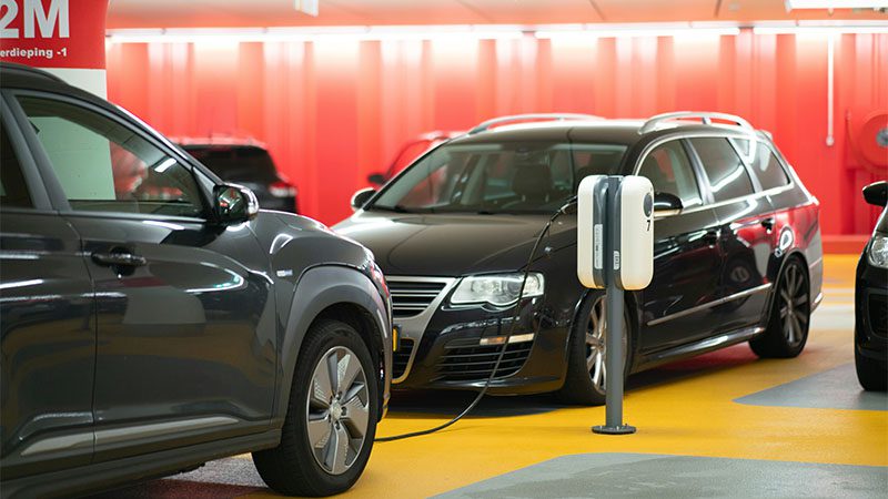 Cars undergoing regular maintenance while being charged.