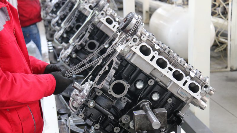 New engine on the production line at Nanjing Woda Auto Technology Co., Ltd., showcasing precision manufacturing for optimal performance.