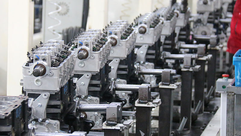 Auto engine assembly line at Woda Auto manufacturing factory.