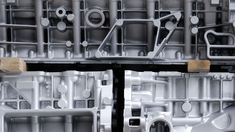 Engine blocks stacked in warehouse at engine supplier facility.