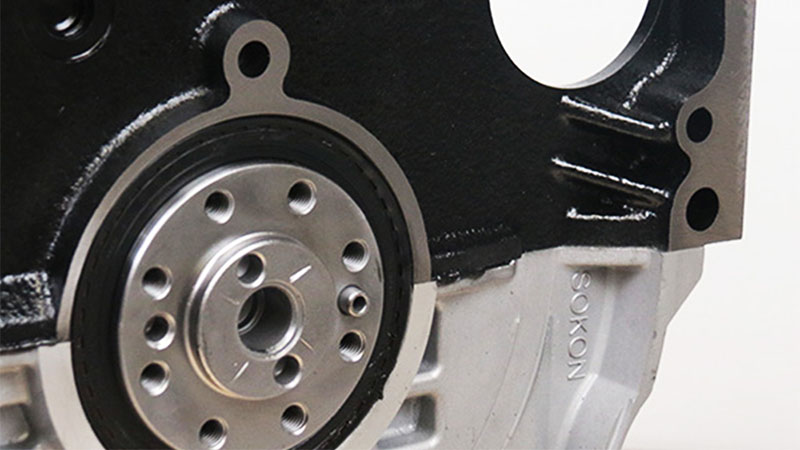 Close-up of a Fiat 1.3 Multijet long block engine showing cylinder block details.