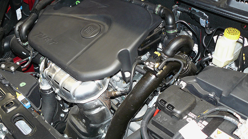 Close-up of Fiat T-Jet engine under the hood.