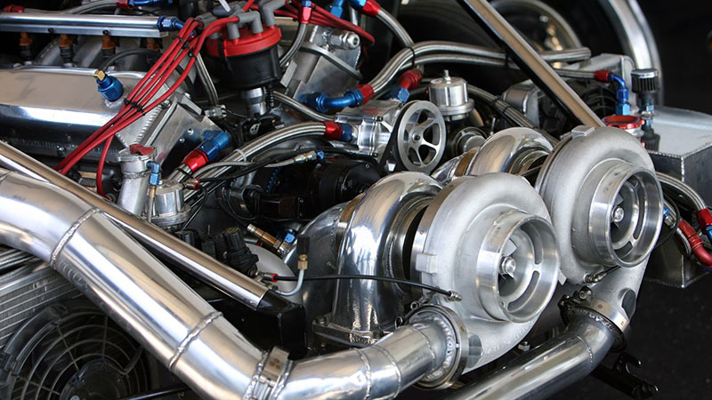 Close-up of turbo engine showing turbocharger and key components.
