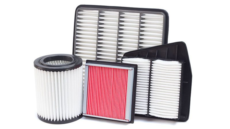 Close-up view of various air filters on display, highlighting different types and designs for automotive applications.