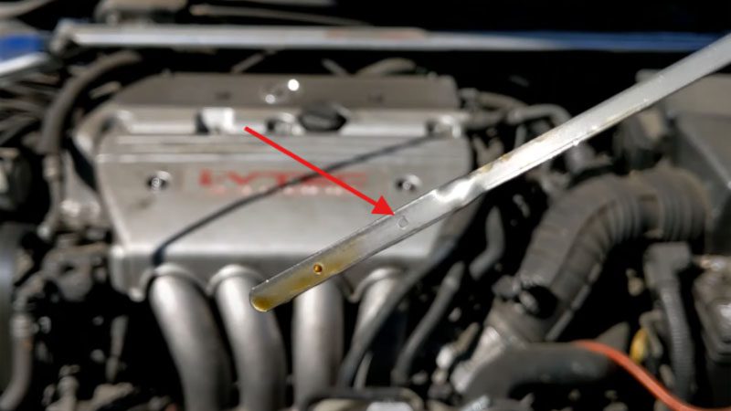 Marca de excesso de óleo do motor.