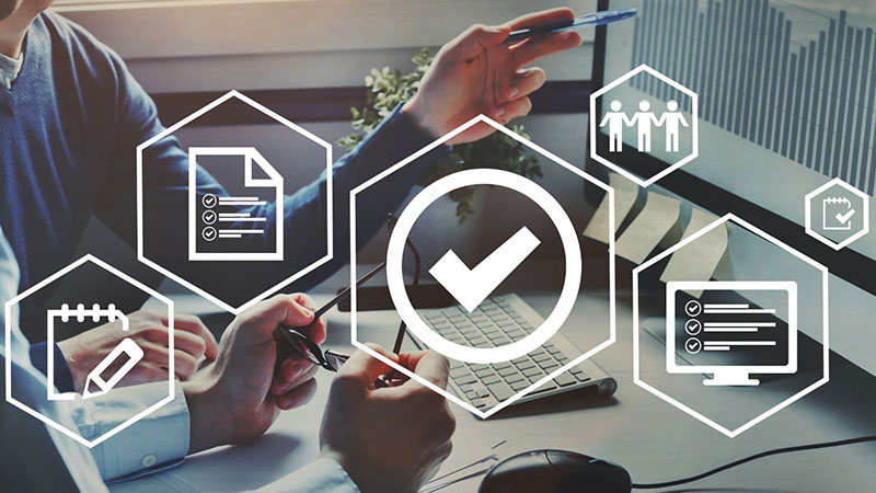 Quality control certification document with a checked seal, symbolizing verified standards and guaranteed product reliability.