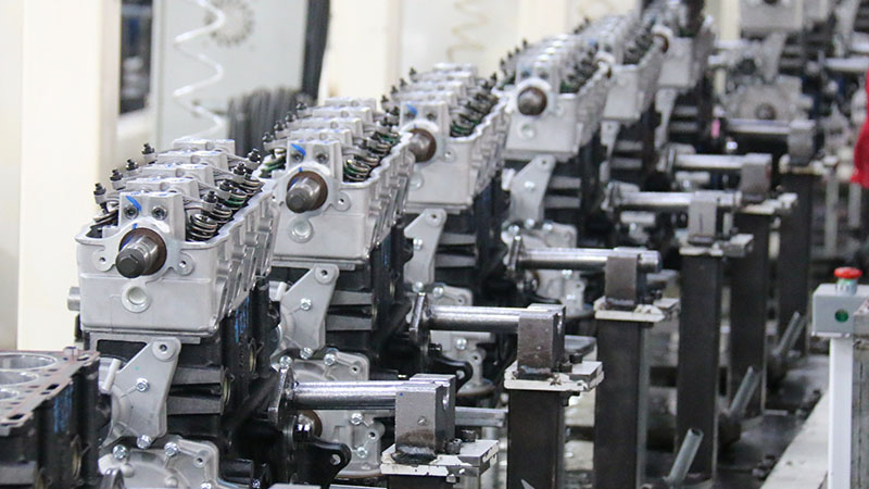 Automotive engine assembly line at Woda Auto factory production facility.