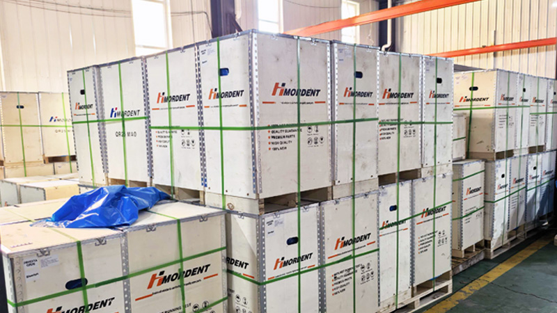 Custom export packaging for automotive engines at Woda Auto factory.