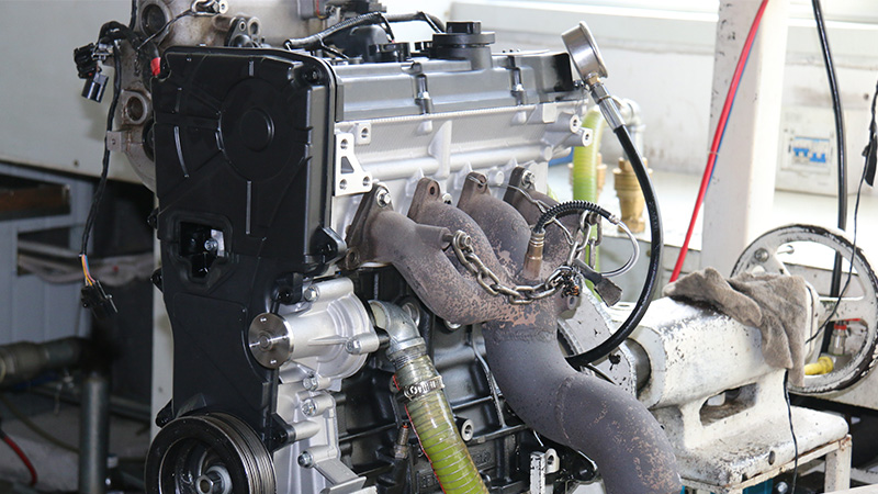 New assembled automotive engines undergoing hot running test at factory.