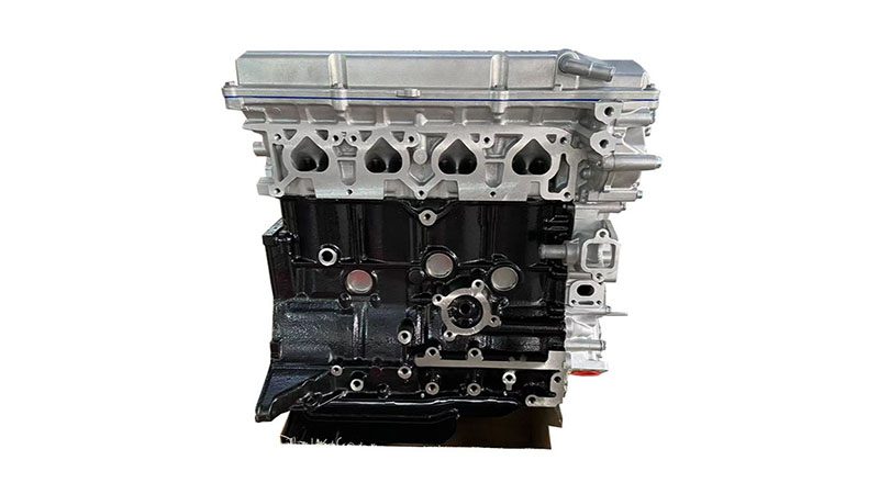 Front view of a KA24 engine, showcasing its components and design for automotive performance.