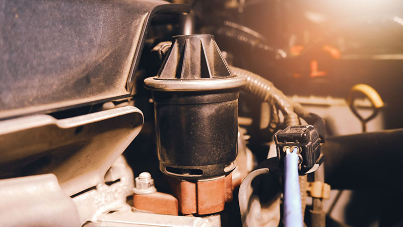 Exhaust gas recirculation (EGR) system installed in a modern engine compartment.