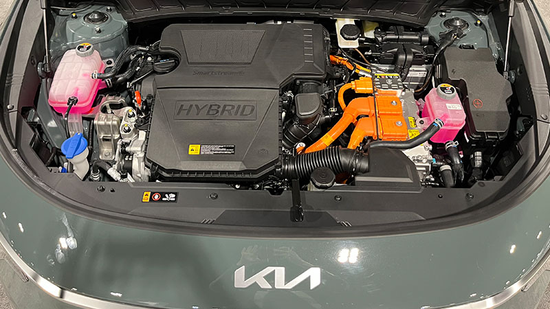 Kia engine bay with the hood open.