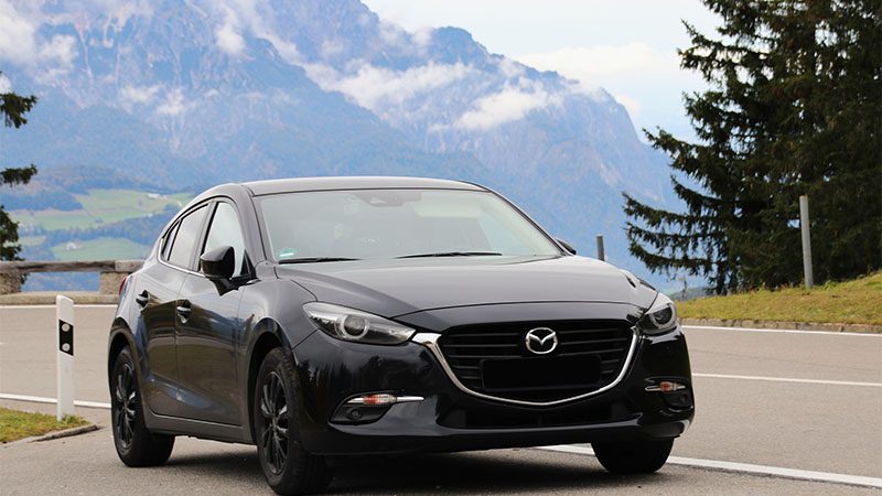 Mazda 3 on the road.