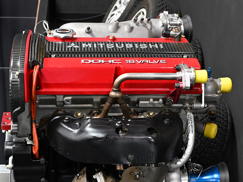 Close-up of a Mitsubishi DOHC 16-valve 4G15 engine.