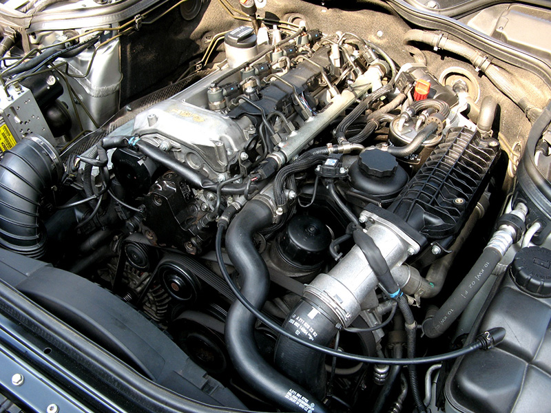 Close-up of a Mercedes OM646 diesel engine under the hood.