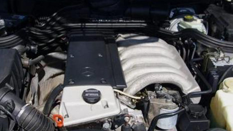Close-up of a Mercedes OM606 diesel engine.