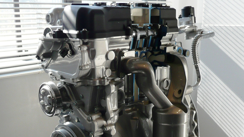 Close-up of Nissan QG18DE engine.