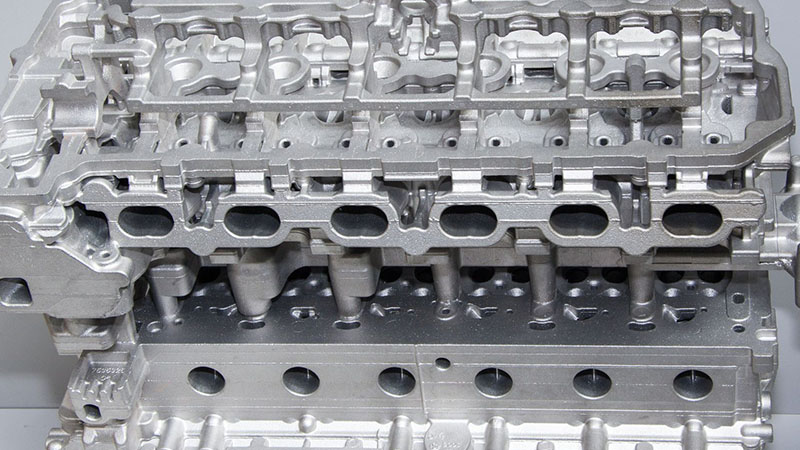 Close-up of engine cylinder head during inspection.