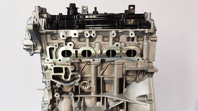 Back view of a Nissan QR25DE Navara bare engine.