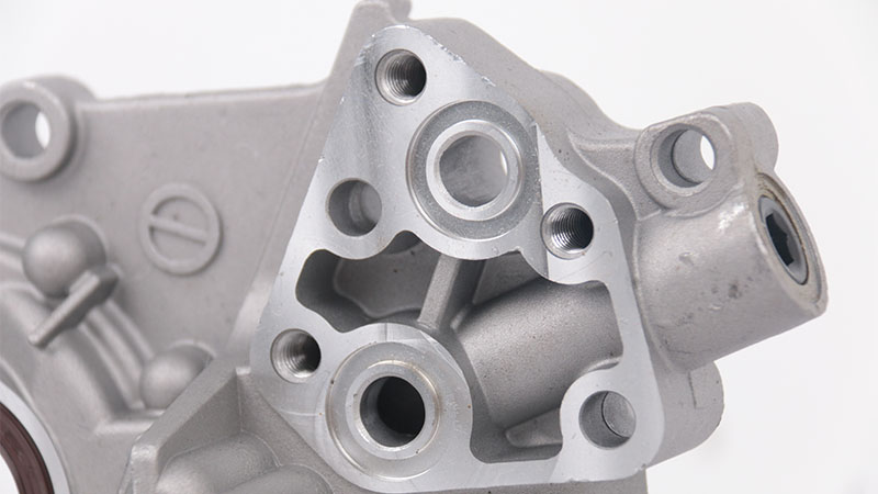 Close-up of a new automotive oil pump.