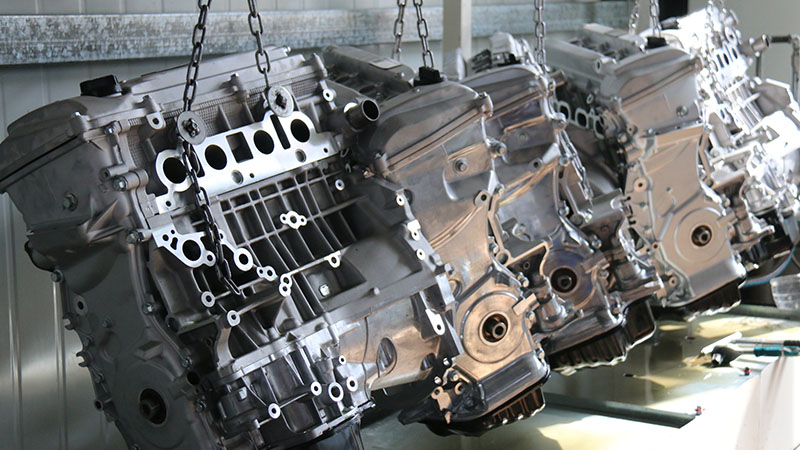 Newly assembled engines ready for testing at Woda Auto manufacturing facility.