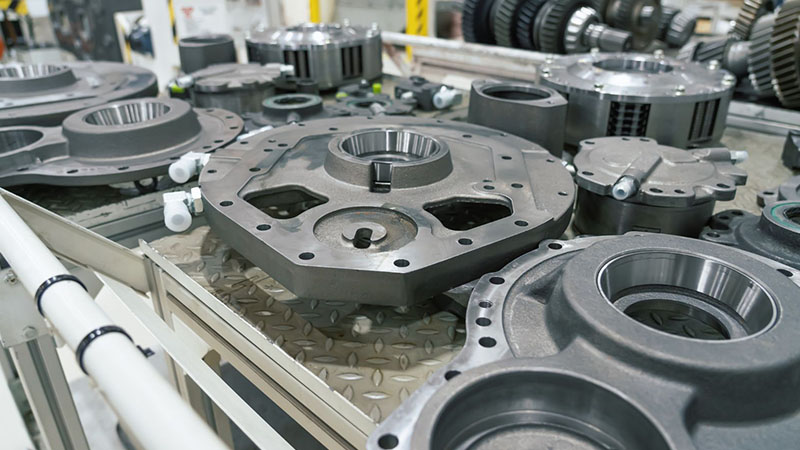 Vehicle metal parts on factory production line.