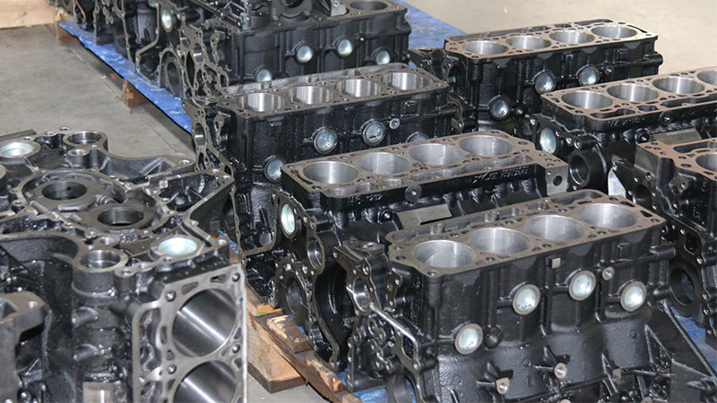 Remanufactured engine parts lined up at an engine manufacturing factory.