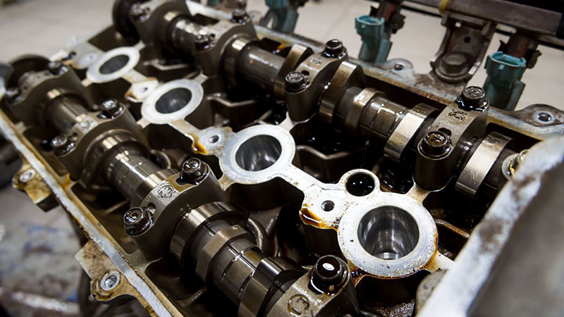 Internal combustion engine with the cover removed for inspection.