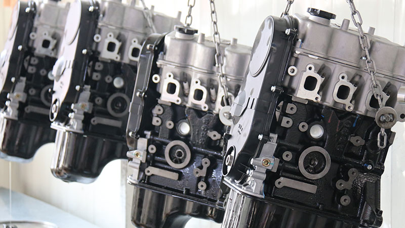 Assembled auto engines on display at Woda Auto factory.