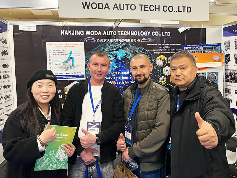 Woda team meeting with customers at an auto parts exhibition