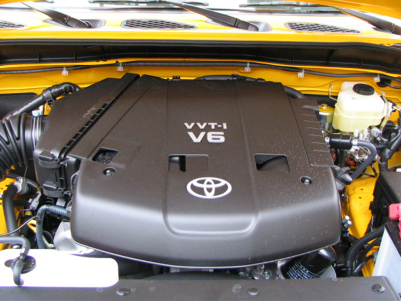 Toyota 1GR-FE 4.0L V6 engine close-up in engine bay.