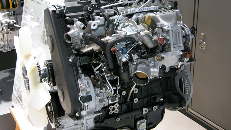 Close-up of Toyota 1KD-FTV turbo diesel engine.