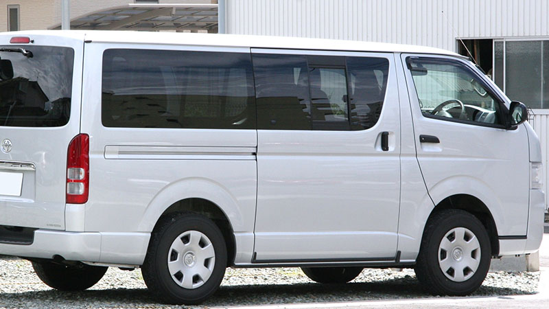 Rear view of Toyota Hiace H200 van.