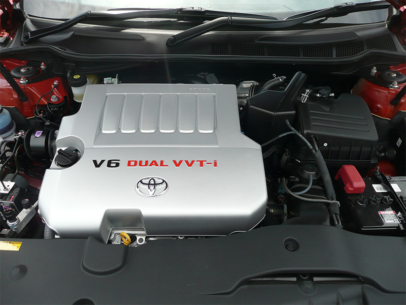 Close-up of a Toyota 2GR-FE V6 engine under the hood of a 2008 Toyota Aurion Sportivo ZR6 sedan.