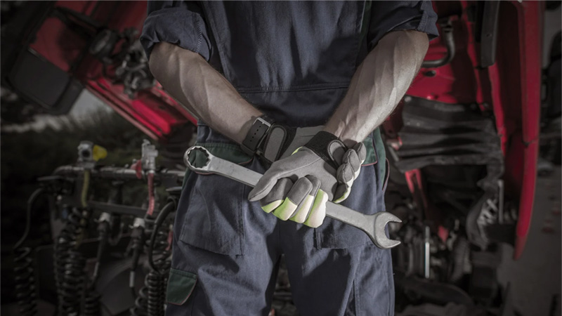 Mechanic preparing for a car engine rebuild.