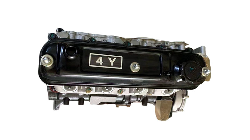 Top view of a Toyota 4Y engine with ‘4Y’ clearly labeled on the cylinder head cover.