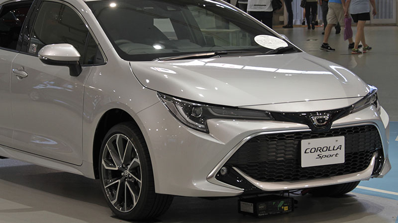 Front view of a Toyota Corolla Sport hatchback with modern grille and sporty exterior design.