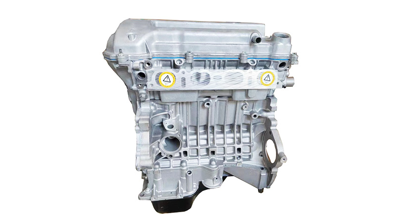 Front view of a Toyota 1ZZ-FE long block engine prepared for replacement or assembly use.