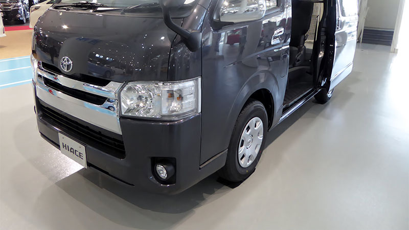 Front view of a Toyota Hiace van.