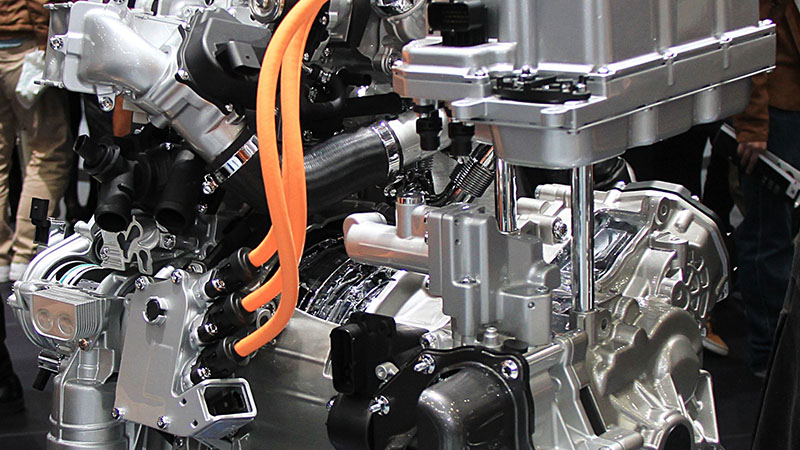 Volkswagen 0.8L TDI TwinDrive hybrid diesel engine prototype showcasing compact design and advanced fuel efficiency technology.