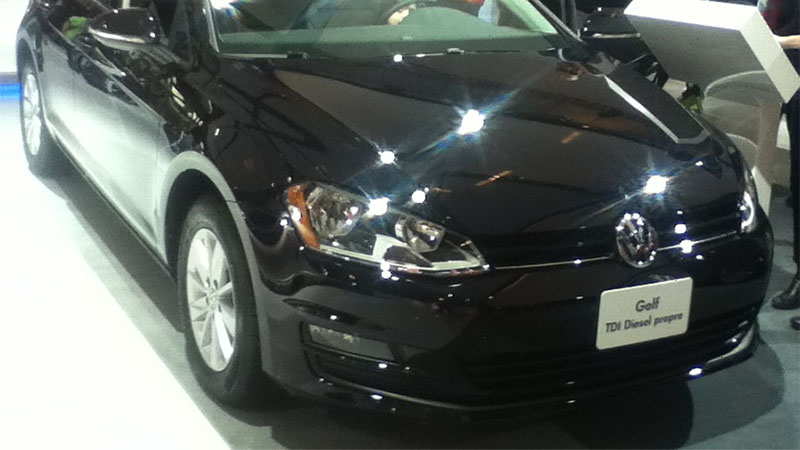 2015 Volkswagen Golf TDI hatchback displayed at auto show.