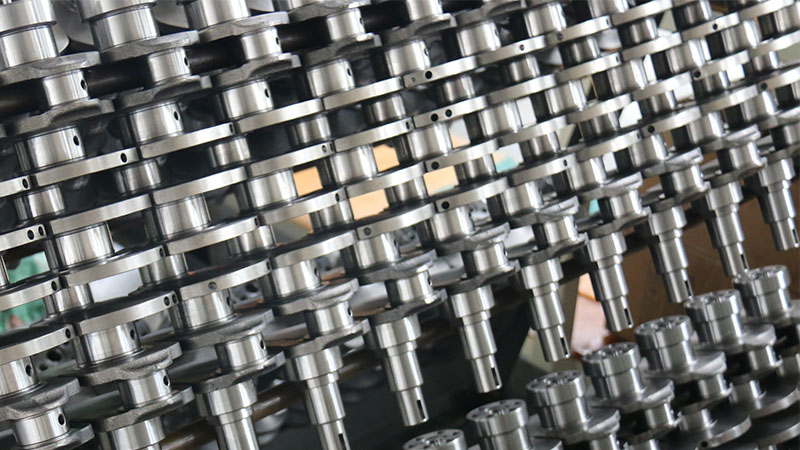 High-quality automotive crankshafts displayed inside Woda Auto’s manufacturing factory.