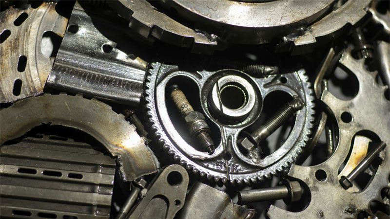 Close-up of clogged or failing fuel injectors, a common cause of the P0300 code (random misfire).